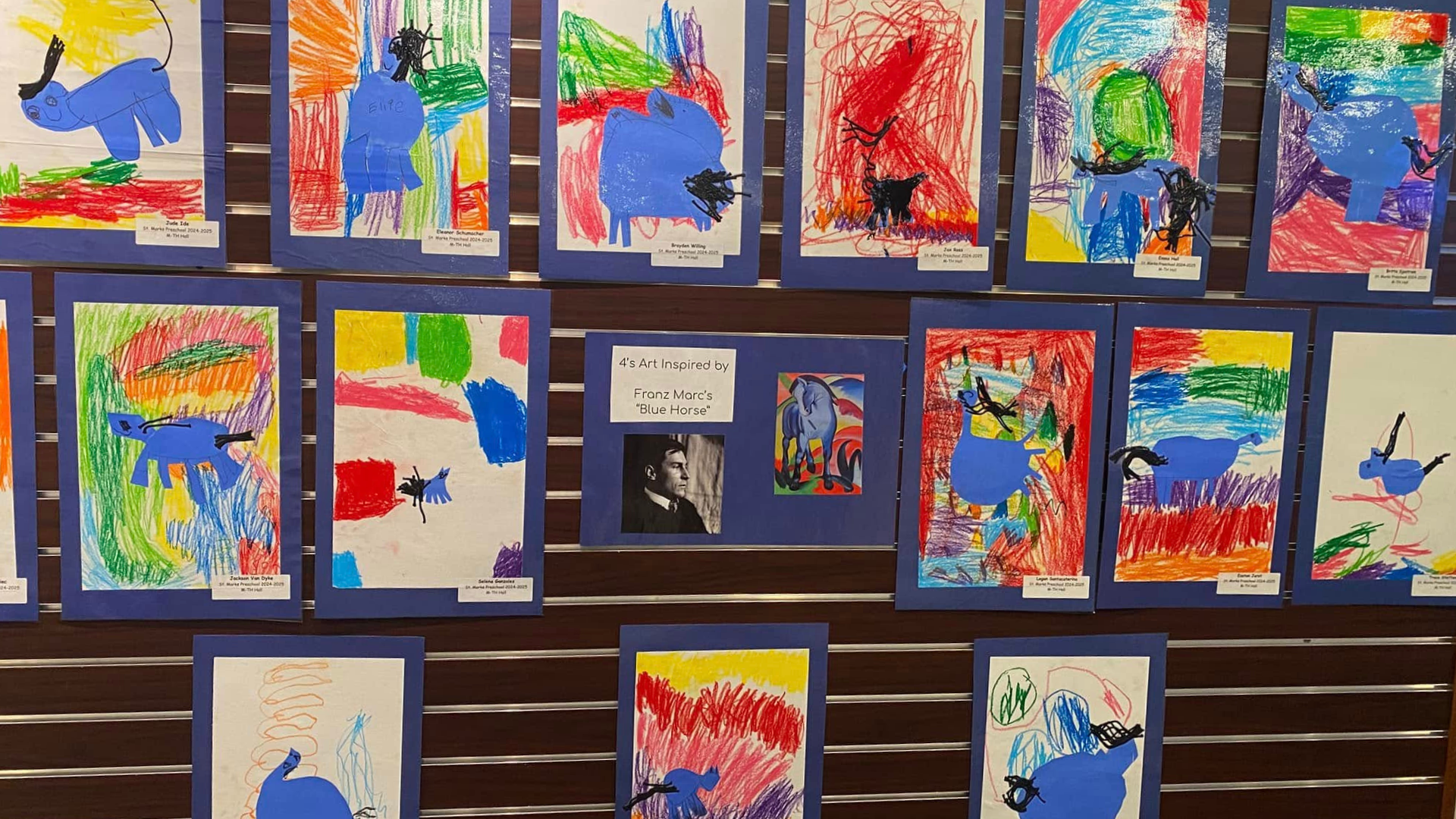 4 year old classroom's art projects inspired by Franz Marc's "Blue Horse," displayed on a bulletin board.