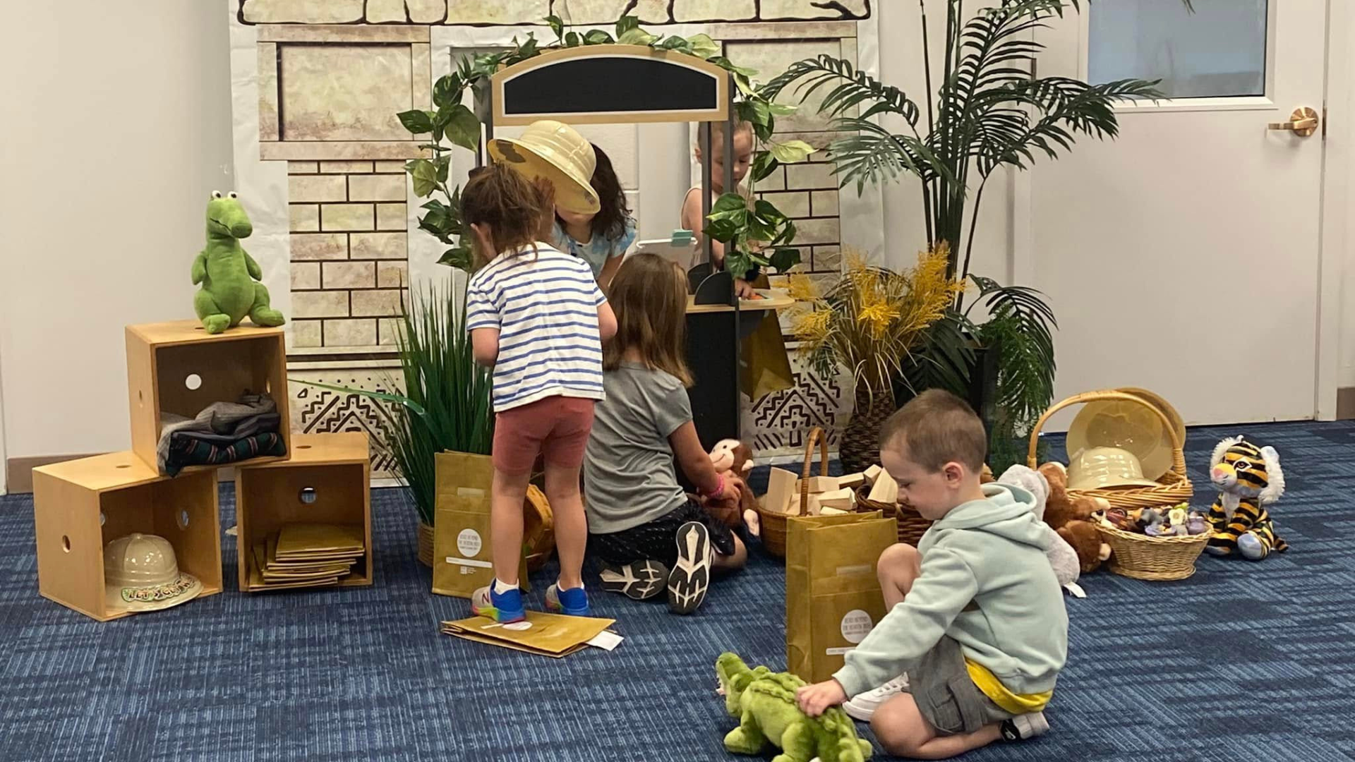 Children playing pretend in an extracurricular enrichment activity.